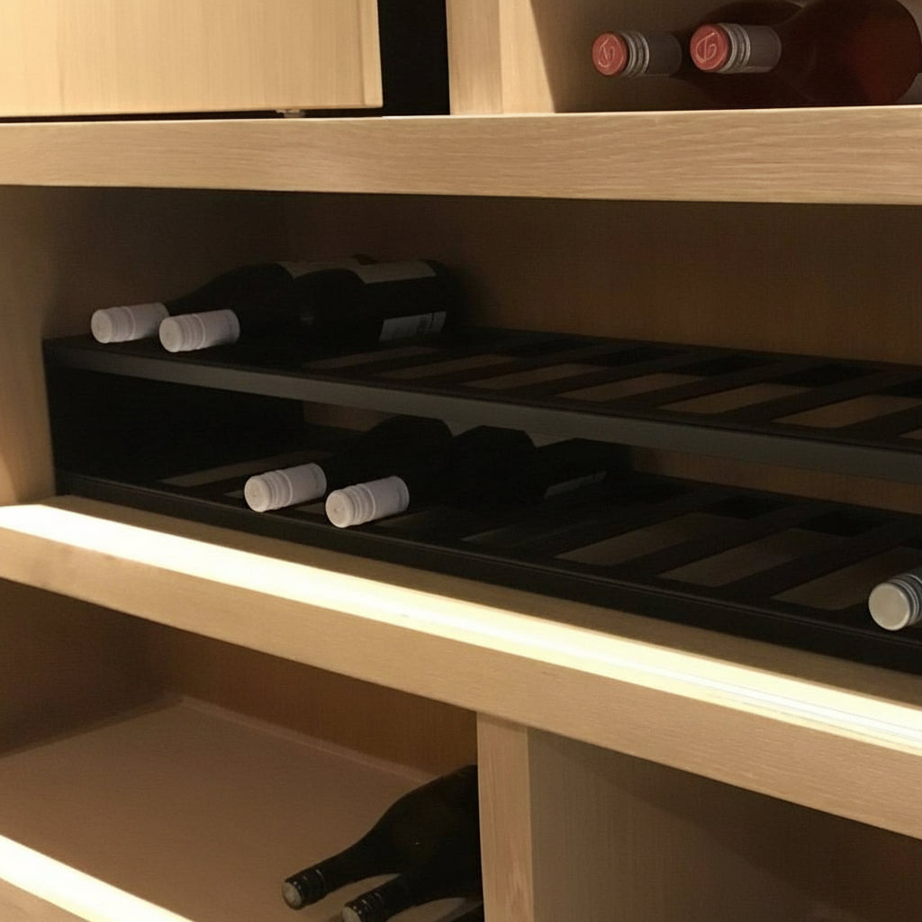 Wine bottles in a wooden wine cabinet with visible brand logo and website.